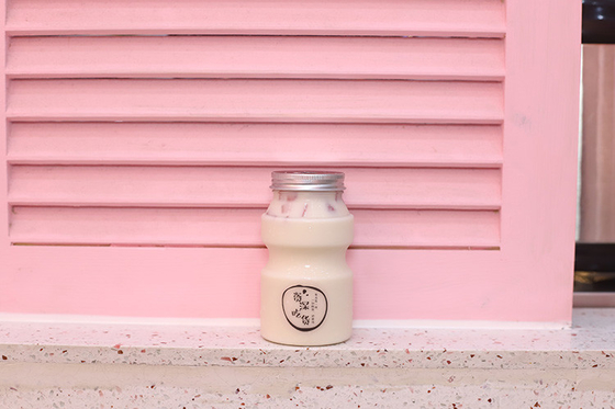 Solution d'emballage des bouteilles de thé au lait modernes pour les boissons de 0,5 kg