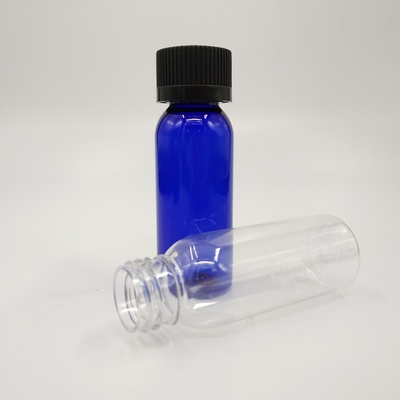 1 oz de bouteilles rondes en plastique bleu cobalt de Boston avec un capuchon à nervures noires