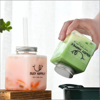 Bouteilles de thé au lait modernes avec vis sur le couvercle en plastique