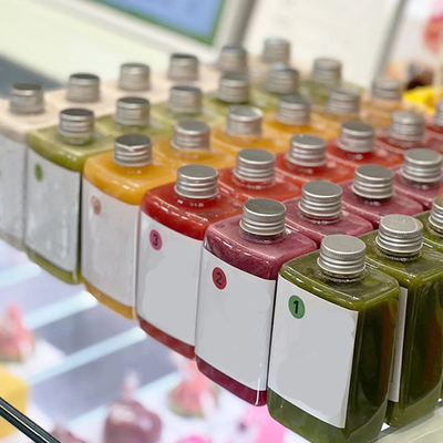 Bouteilles de thé au lait en plastique étanches aux fuites avec poignées ergonomiques
