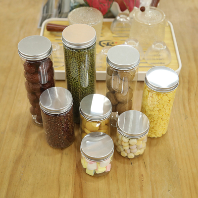 Promotion de temps limité Bouteilles en plastique avec couvercle pour aliments Bouteilles en plastique pour épices Bouteilles en plastique en PET avec stock