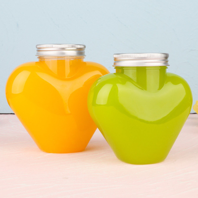Des bouteilles modernes de thé au lait à l'épreuve des fuites en couleurs claires et personnalisées