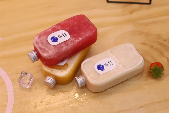 Bouteilles de thé au lait et à la boisson claires carrées et rondes avec vis étanche sur les couvercles