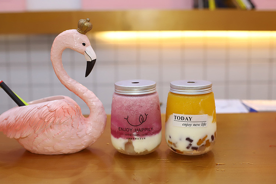 Bouteilles de thé au lait de 350 ml, claires, élégantes pour les affaires