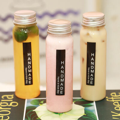 Bouteilles de thé au lait résistantes aux fuites vis en plastique sur couvercle récipients réutilisables durables idéaux pour l'emballage et le stockage des boissons