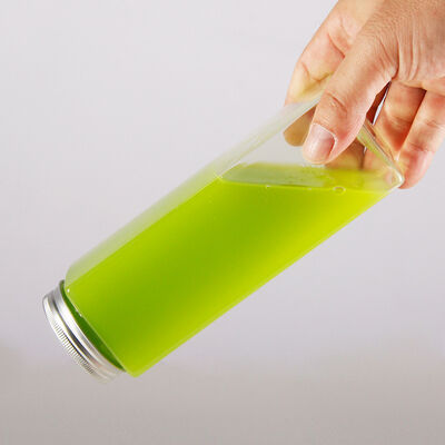 Bouteilles de thé au lait de 0,5 kg avec couvercle à vis et isolation, offrant des solutions d'emballage sécurisées pour les produits de boissons