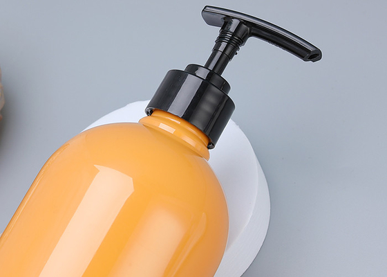 le distributeur en plastique de pompe de shampooing orange de 25mm met 900ml en bouteille