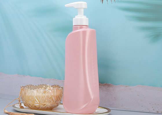 La pompe rose perlée d'ANIMAL FAMILIER met les pissettes en bouteille en plastique du corps 750ml