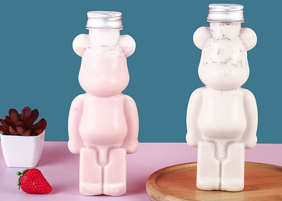 350ml 400ml 500ml 700ml Vente à chaud personnaliser pour animaux de compagnie Bouteille de jus en forme d'ours en plastique pour boissons avec bouchon et sangles