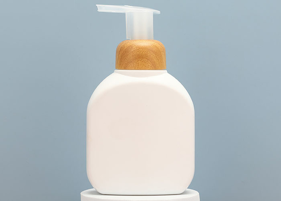 La bouteille écumante de pompe de savon de main CHOIENT écologique rechargeable en plastique