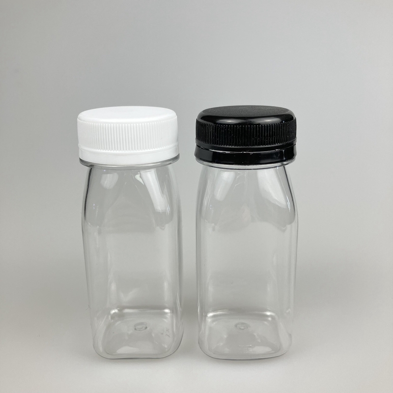 Bouteille de jus carrée de 60 ml Bouteille à boire Bouteille à boire carrée avec bouchon multicolore