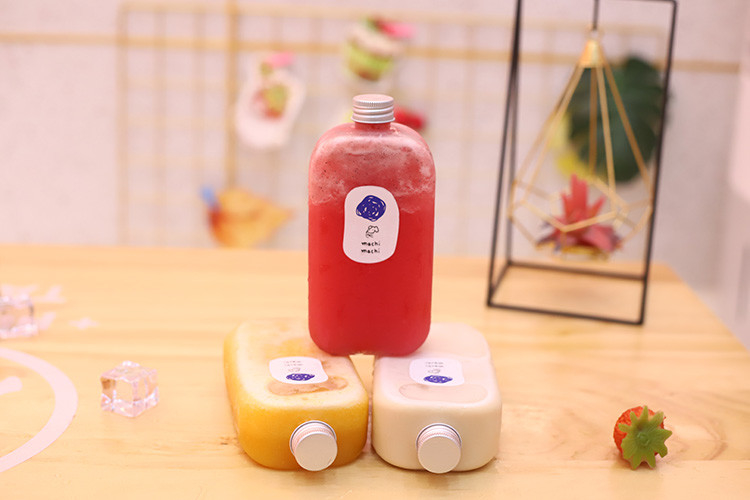 Bouteilles de thé au lait et à la boisson claires carrées et rondes avec vis étanche sur les couvercles