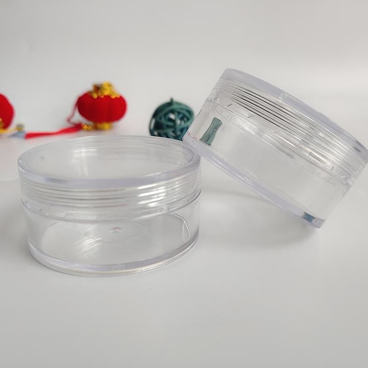Pot cosmétique en plastique à surface lisse avec impression personnalisée, conçu pour l'emballage de crèmes, lotions et produits de beauté pour les soins de la peau